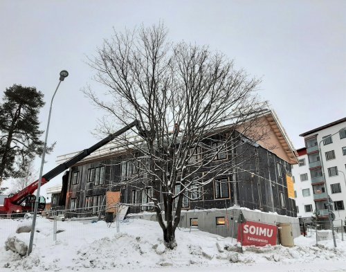 Rakennusaikainen kuva talosta ulkopuolelta.
